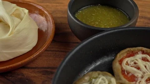 Mexican picaditas with cheese from Oaxaca Stock Footage 278565156