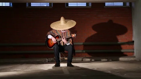 Mexican plays guitar overall plan Видео 76324853