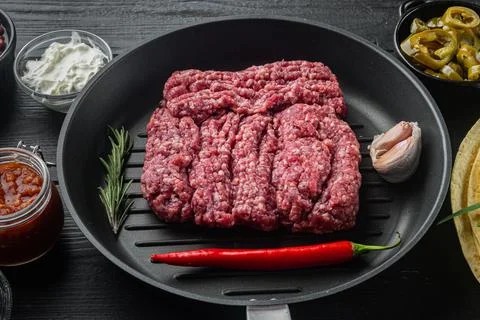 Mexican quesadilla raw beef minced meat and ingredients Stock Photos