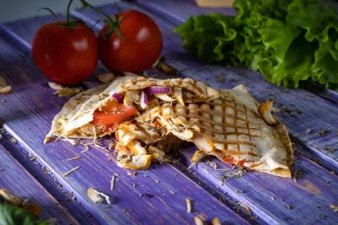 Mexican Quesadilla wrap with chicken, corn and sweet pepper and salsa. Top vi 写真素材