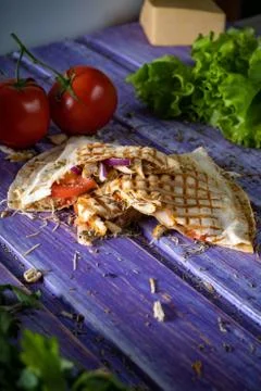Mexican Quesadilla wrap with chicken, corn and sweet pepper and salsa. Top vi 写真素材