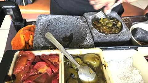 Mexican Salsa Being Prepared by Hand Stock Footage 317350862