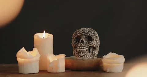 Mexican skull with candles on the table Stock Footage 140880559