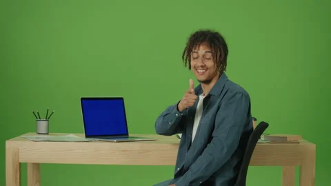 Mexican StudentTyping on Blue Screen Laptop Working in Internet,Doing Remote Job Stock Footage 219757550