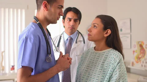 Mexican surgeon explaining operation procedure to patient Video stock 25629077