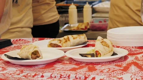 Mexican tacos shells with beef meat on street food festival, onion, chef cooking Stock Footage 192436666