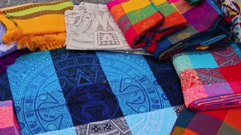 Mexican Textiles Display Featuring Aztec Calendar Motif Mexico City Market Video stock 342574460
