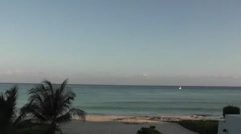 MEXICO-024 LONG SHOT OF BOAT AND PALMS Stock Footage 10607453