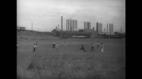 MEXICO - 1938 - Factory workers play soccer on a break before they return to Stock Footage 264649697