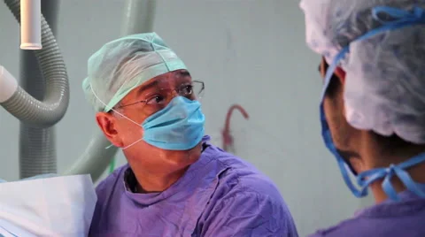 Mexico, 2014: CLOSE UP. Face surgeon during surgery Stock Footage 48477219