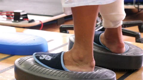 Mexico, 2014: CLOSE UP-HANDHELD SHOT. Feet exercises in a rehab clinic. Stock Footage 42739840
