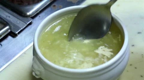 Mexico, 2014: CLOSE UP-HANDHELD SHOT. Chicken Soup being served in a dish. Stock Footage 42798577