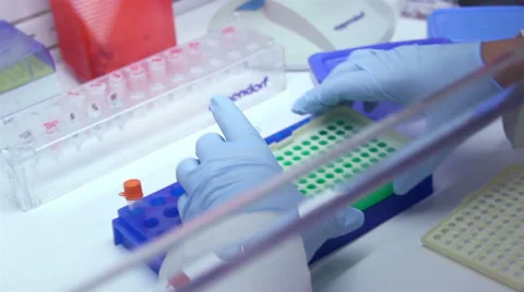Mexico, 2014: CLOSE UP-HANDHELD SHOT. Laboratory worker clean test tubes. Stock Footage 44988903