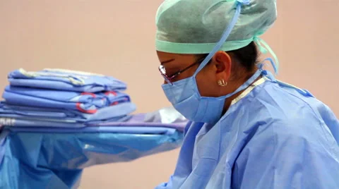 Mexico, 2014: CLOSE UP-TILT DOWN. Nurse preparing surgery material. Stock Footage 45028550