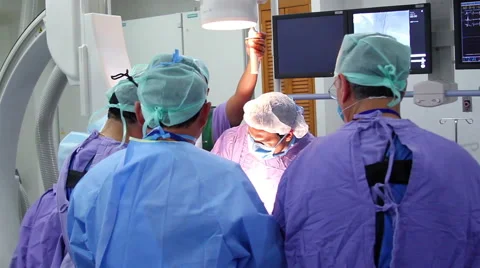 Mexico, 2014: FULL SHOT-BACK SHOULDER. Surgeons during surgery. Stock Footage 48470443