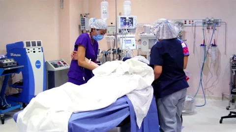 Mexico, 2014: FULL SHOT-HANDHELD SHOT. Nurses preparing a patient for surgery. Stock Footage 45022264