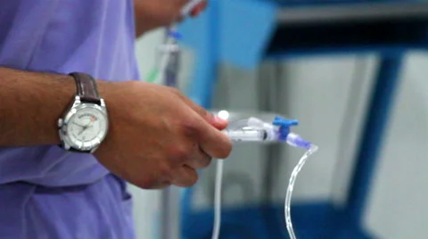 Mexico, 2014: FULL SHOT-PAN RIGHT. Nurse attend a baby in a neonatology room. Stock Footage 45008300
