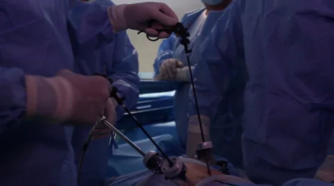 Mexico, 2014: MEDIUM SHOT-HANDHELD SHOT. Surgeons working in a OR. Stock Footage 42743382
