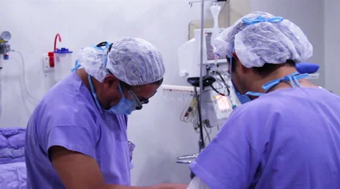Mexico, 2014: Surgeons preparing surgical instrumets for surgery. Stock Footage 48208049