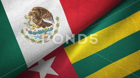 Mexico and Togo two flags textile cloth, fabric texture Stock Photos