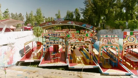 Mexico City - Dec 28 2018: Xochimilco Colorful Trajineras or Gondolas on Canals Stock-Footage 101022037