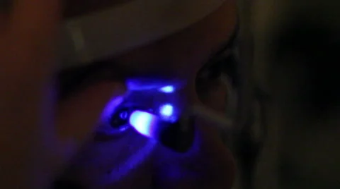 Mexico: CLOSE UP. Oculist doing an check up in the eyes of a patient. Stock Footage 48873128