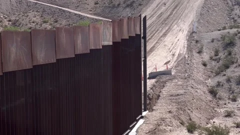 Mexico: Construction of border wall between Ciudad Juarez and New Mexico ... Stock Footage 333287070
