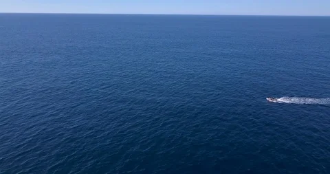 Mexico Drone Ocean 4K Fast Move Over Boat Speeding in Ocean Stock Footage 95598562