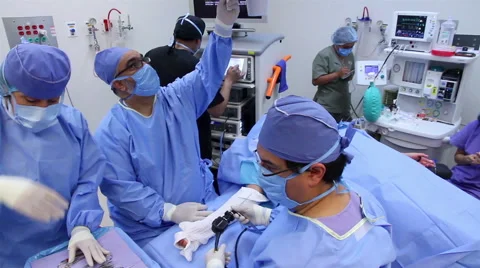 Mexico: FULL SHOT-BACK SHOULDER. Surgeons during surgery. Stock Footage 48948573