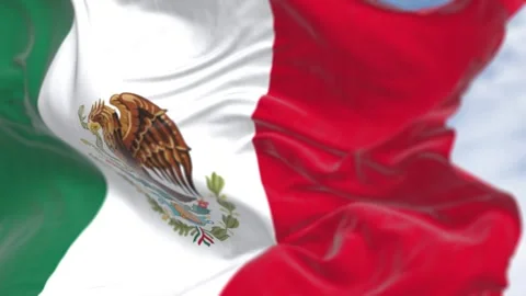 Mexico national flags waving on a clear day Stock Footage 289632536