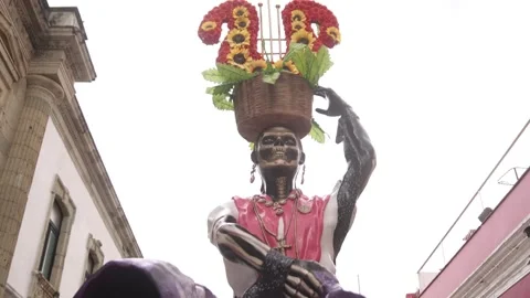 Mexivco float parade representing the death during the dia de los muertos in Stock Footage 295835298