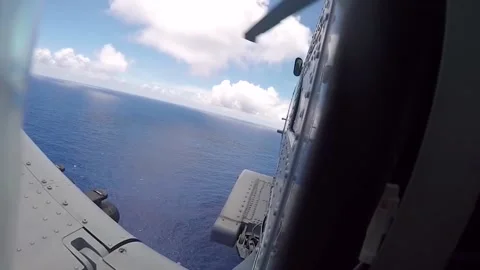 MH-60 Seahawk Fires AGM-114 Hellfire Missiles 003 Stock Footage 166445904