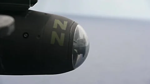 MH-60 Seahawk Fires AGM-114 Hellfire Missiles 010 Stock Footage 166446131