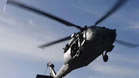 MH-60 Seahawk helicopter hovering Stock Footage 104855681