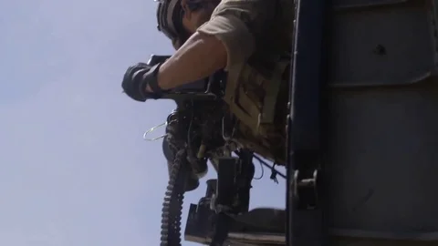 MH-60M Blackhawk door gunner Stock Video Pond5