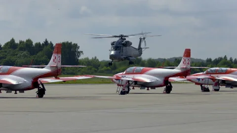 Mi-14PŁ helicopter doing maneuvers at air show in Gdynia Stock Footage 136493192