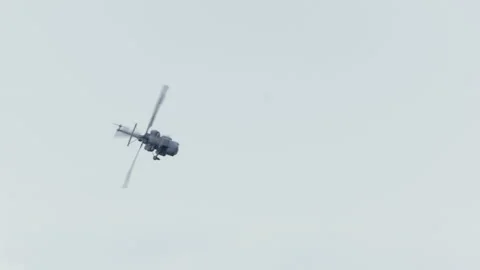Mi-14PŁ helicopter doing maneuvers at air show in Gdynia Stock Footage 136498817