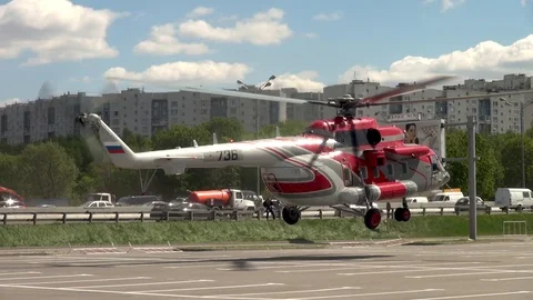 Mi-171 helicopter vertically lands into parking lot. Close-up. Stock Footage 106553387
