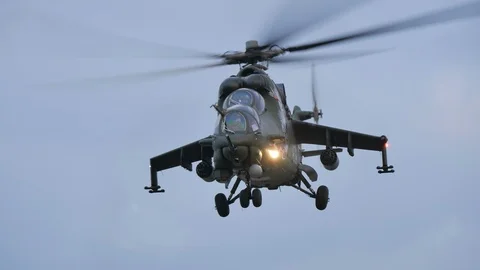 Mi-24 attack helicopter just after takeoff Stock Footage 123291189
