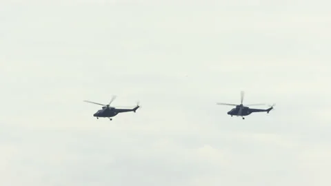 Mi-24 helicopters doing maneuvers at air show in Gdynia Stock-Footage 136496496