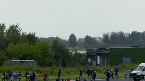 Mi-24 helicopters doing maneuvers at air show in Gdynia Stock Footage 136496783