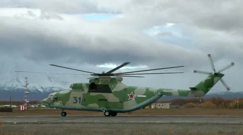 The MI-26 helicopter warms up the engine and tries elevators Video stock 12684819