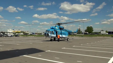Mi-8 helicopter with rotating blades on background Moscow Ring Road. Stock Footage 106771930