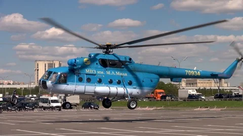 Mi-8 helicopter vertically takes off on background Moscow Ring Road. Stock Footage 106771965