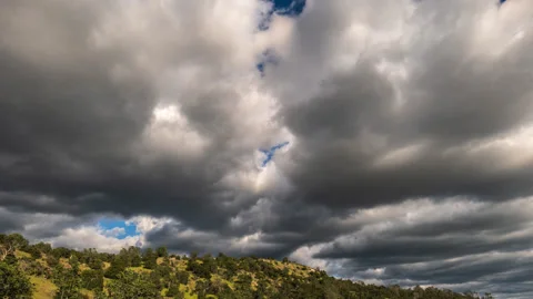 Mi-Level Cloud Time Lapse above Sierra Nevada Oak Woodland Stock Footage 279345220