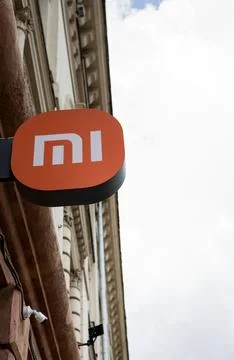 Mi logo. Xiaomi store sign. Stock Photos