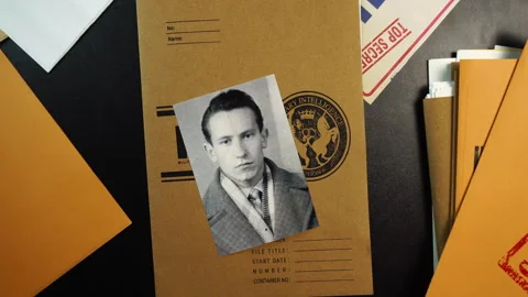 MI6 Case File Folder and Photo of Oleg Gordievsky KGB Colonel Double Agent in Stock Footage 327319586