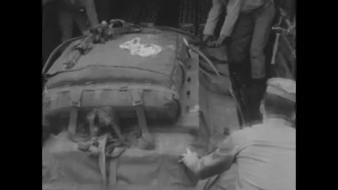 MIAMI - 1960s - US Marines begin loading cargo onto a C-119 Flying Boxcar. 스톡 동영상 340584437