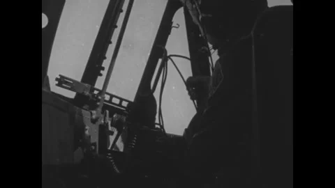 MIAMI - 1960s - US Marines begin dropping cargo by parachute from a C-119 Flying Stock Footage 340584482
