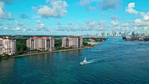 Miami beach from drone. Miami panorama with passing yacht, Florida. Panoramic Stock Footage 292415650
